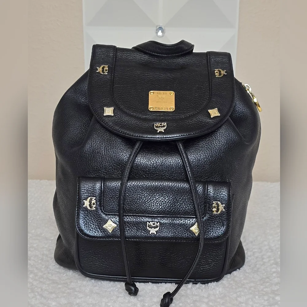 MCM Black Leather Studded Backpack Gold Hardware Drawstring Side Zip